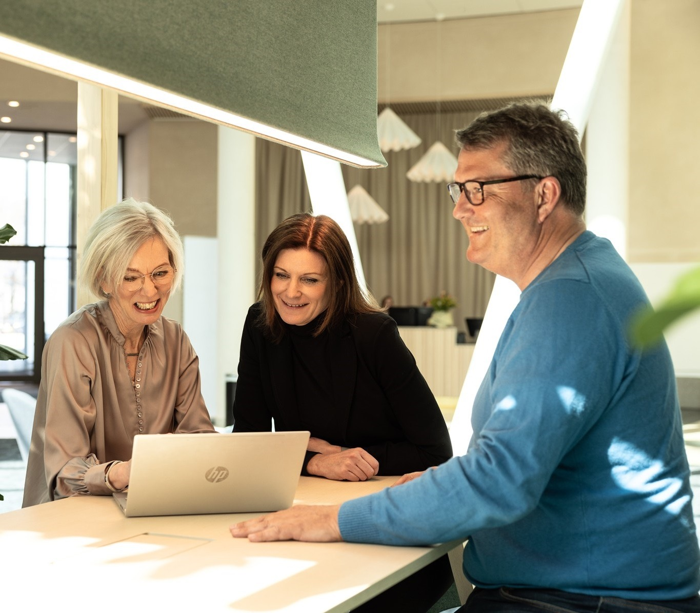 Optema consultants working together